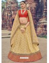 Cream And Orange Jacquard Silk Thread Embroidered Designer Lehenga Choli