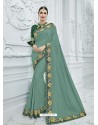 Grayish Green Silk Fabrics Heavy Embroidered Designer Saree