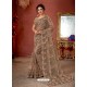 Light Brown Soft Net Stone Embroidered Party Wear Saree