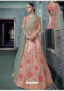 Pink Net Heavy Embroidered Bridal Lehenga Choli