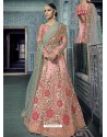 Pink Net Heavy Embroidered Bridal Lehenga Choli