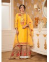 Yellow And Beige Faux Georgette Heavy Embroidered Sharara Salwar Suit