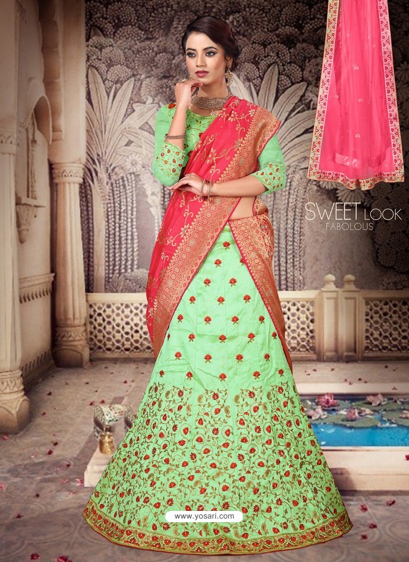 Photo of Pastel Pink and Mango Lehenga with Parrot Green Dupatta