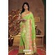 Classy Parrot Green Silk Wedding Party Wear Saree