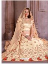 Awesome Cream Heavy Embroidered Party Wear Lehenga