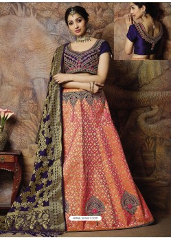 Scintillating Peach Heavy Embroidered Wedding Lehenga Choli