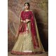 Scintillating Cream Heavy Embroidered Wedding Lehenga Choli