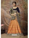 Scintillating Light Orange Heavy Embroidered Wedding Lehenga Choli