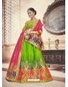 Scintillating Parrot Green Heavy Embroidered Wedding Lehenga Choli