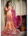 Scintillating Light Orange Heavy Embroidered Bridal Lehenga Choli