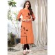 Ravishing Orange Designer Readymade Kurti