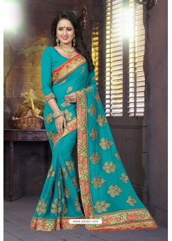 Turquoise Heavy Embroidered Designer Blooming Georgette Sari