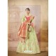 Green Heavy Embroidered Silk Wedding Lehenga Choli