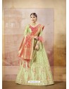 Green Heavy Embroidered Silk Wedding Lehenga Choli