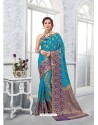 Turquoise Glossy Silk Party Wear Sari