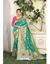 Turquoise Designer Party Wear Lichi Silk Sari