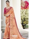 Light Orange Heavy Embroidered Designer Party Wear Sari