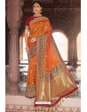 Orange Heavy Embroidered Silk Party Wear Sari