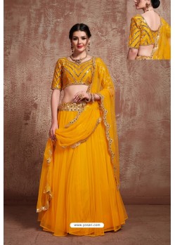 Yellow Heavy Embroidered Soft Net Wedding Lehenga Choli