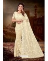 Cream Net Heavy Embroidered Party Wear Saree