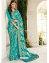 Turquoise Party Wear Designer Brasso Embroidered Sari