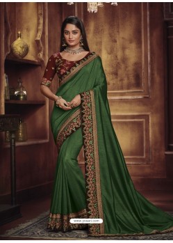 Delightful Dark Green Heavy Silk Party Wear Designer Saree