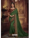 Delightful Dark Green Heavy Silk Party Wear Designer Saree