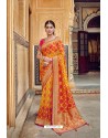 Yellow And Red Banarasi Silk Heavy Embroidered Designer Saree