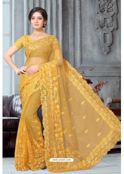 Mustard Net Heavy Embroidered Party Wear Saree