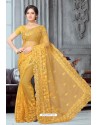 Mustard Net Heavy Embroidered Party Wear Saree