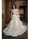 Off White Net Heavy Embroidered Lehenga Choli