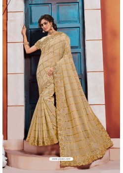 Pleasing Golden Heavy Embroidered Designer Jute Silk Saree