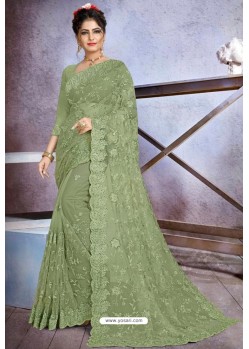 Girlish Green Net Heavy Embroidered Designer Saree