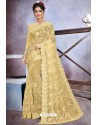 Light Yellow Net Heavy Embroidered Designer Saree