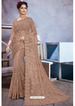 Fabulous Light Brown Net Heavy Embroidered Designer Saree