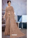 Fabulous Light Brown Net Heavy Embroidered Designer Saree