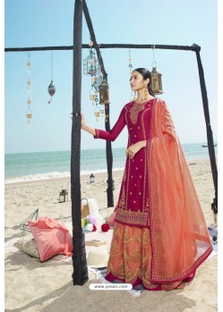 Rani And Orange Designer Bridal Wear Heavy Net Lehenga Suit