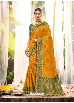 Mustard Heavy Embroidered Designer Wedding Wear Dola Silk Sari