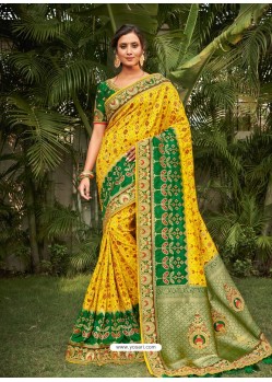 Yellow Heavy Embroidered Designer Wedding Wear Dola Silk Sari