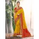 Astonishing Mustard Heavy Embroidered Designer Wedding Wear Dola Silk Sari