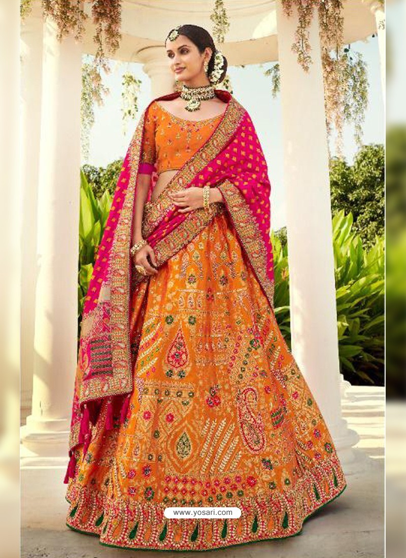 Orange Ravishing Heavy Embroidered Designer Wedding Wear Lehenga Choli