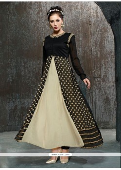 Adorning Black And Cream Net Anarkali Salwar Kameez
