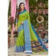 Parrot Green Latest Designer Party Wear Crystal Silk Sari