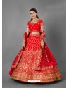 Red Scintillating Designer Heavy Bridal Wear Lehenga