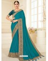 Turquoise Designer Classic Wear Vichitra Silk Sari