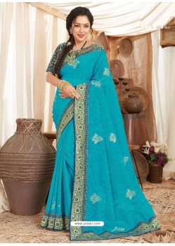 Turquoise Heavy Designer Wedding Wear Fancy Fabric Sari