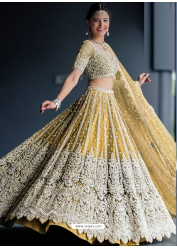 Yellow Designer Wedding Wear Heavy Butterfly Net Lehenga Choli