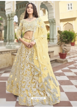 Light Yellow Designer Wedding Wear Heavy Butterfly Net Lehenga Choli