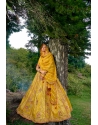 Yellow And Rust Designer Bridal Silk Heavy Lehenga Choli