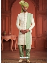 Cream And Green Pure Silk Heavy Wedding Wear Groom Sherwani